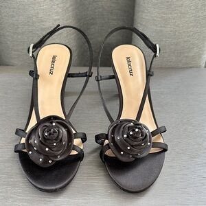 Black Strappy Heels with Floral Detail by Lola Cruz - Anthropologie